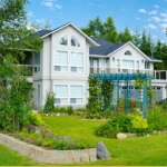 large modern home in wooded area