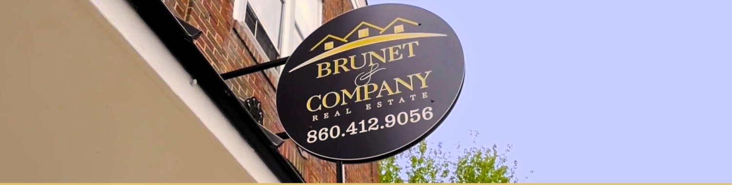 Brunet & Company Real Estate sign outside office in Killingly, Connecticut