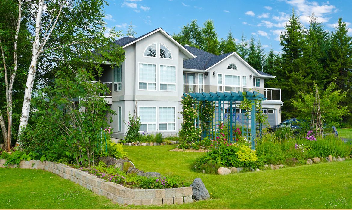 large modern home in wooded area